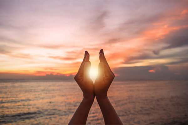 Hands around sun