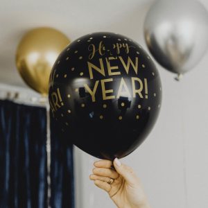 Woman holding balloon