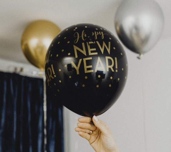 Woman holding balloon